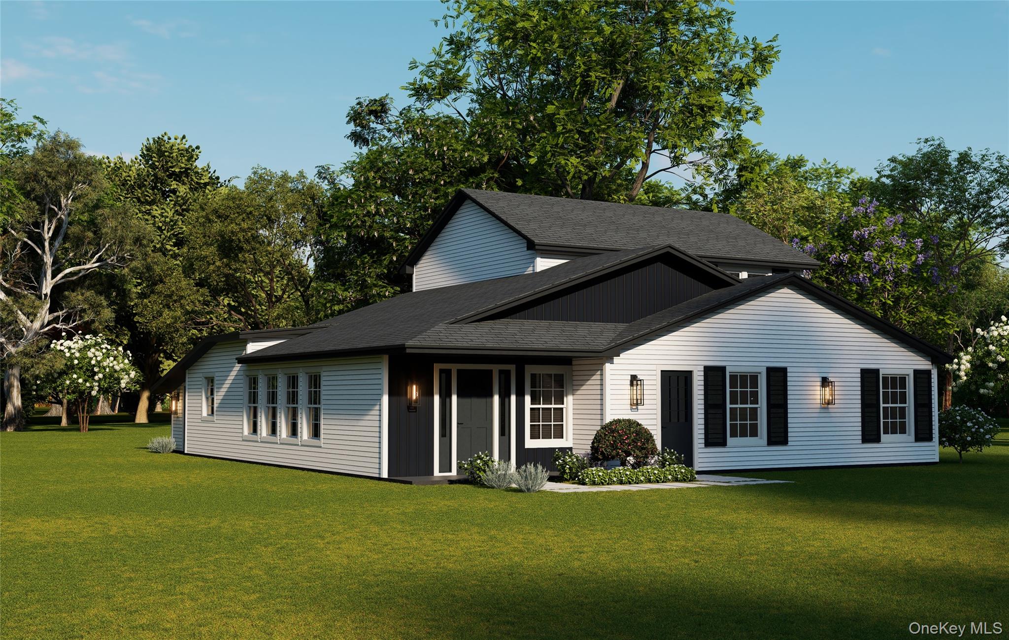 a front view of a house with a garden