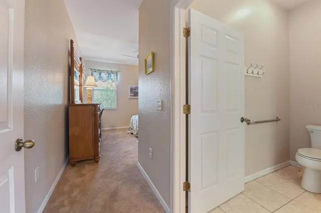a bathroom with a granite countertop sink