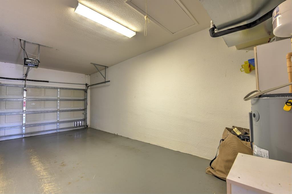 3181 Matecumbe Key Road, Unit 28 Punta Gorda, FL 33955 - Photo 27 of 39 a view of room and garage