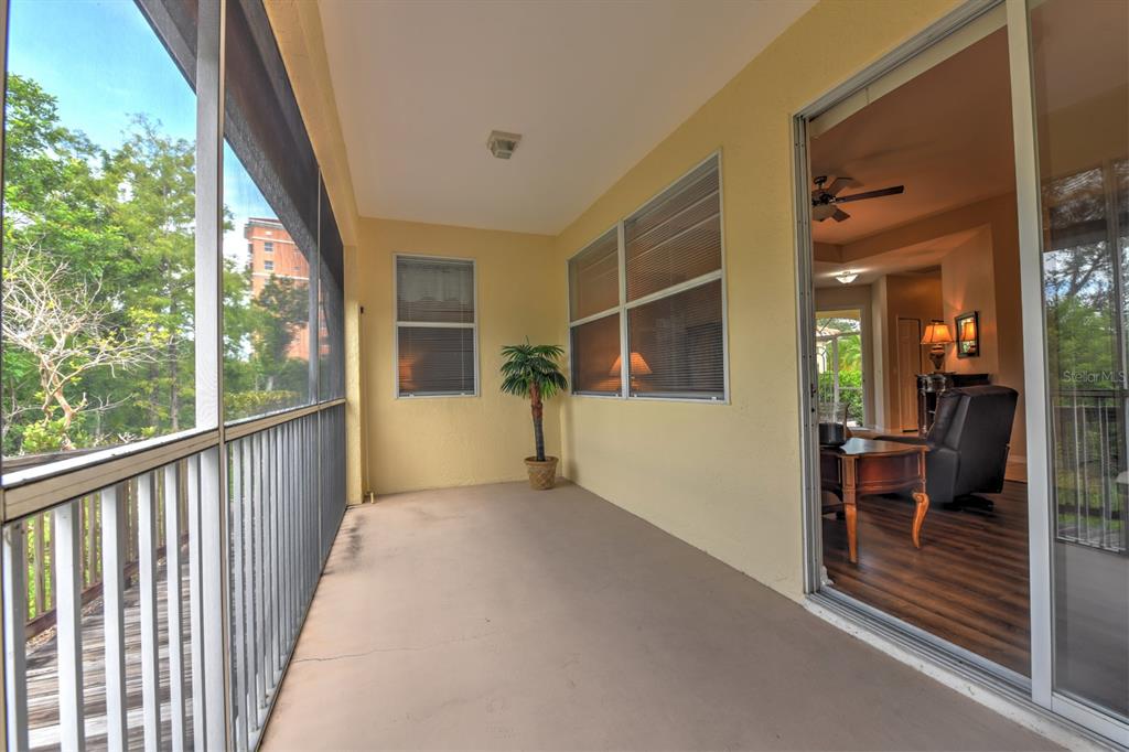 3181 Matecumbe Key Road, Unit 28 Punta Gorda, FL 33955 - Photo 39 of 39 a view of a porch with furniture