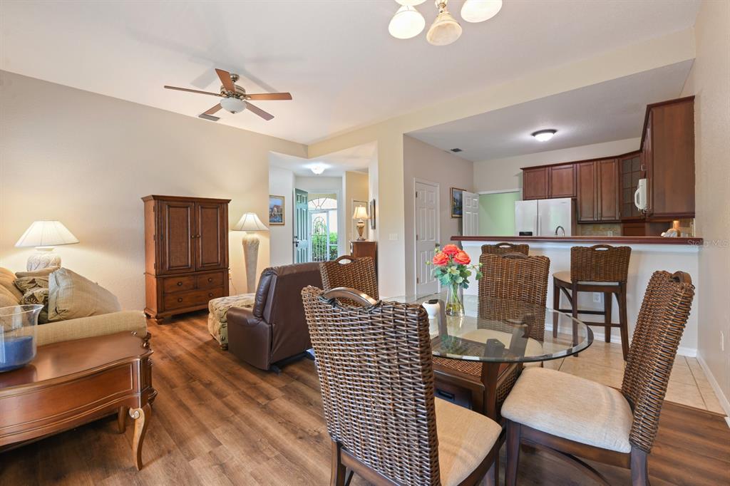 3181 Matecumbe Key Road, Unit 28 Punta Gorda, FL 33955 - Photo 7 of 39 a dining room with furniture and window