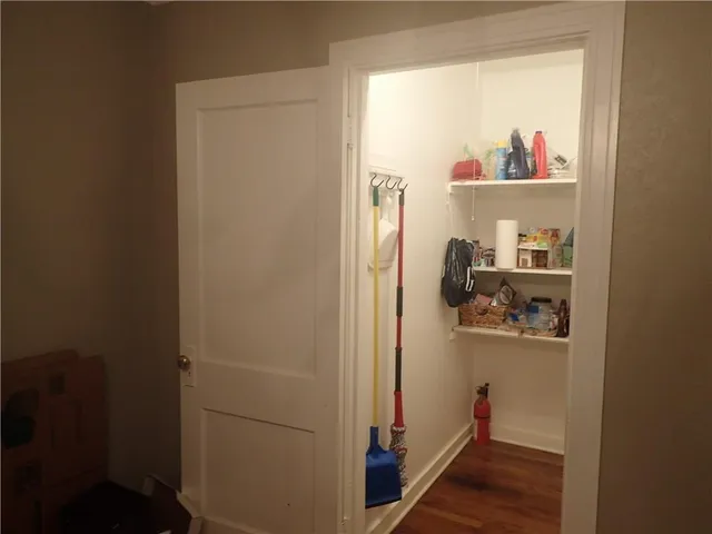 a room with storage and utility