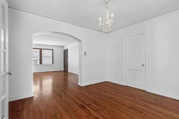 a view of livingroom with hardwood floor and hallway