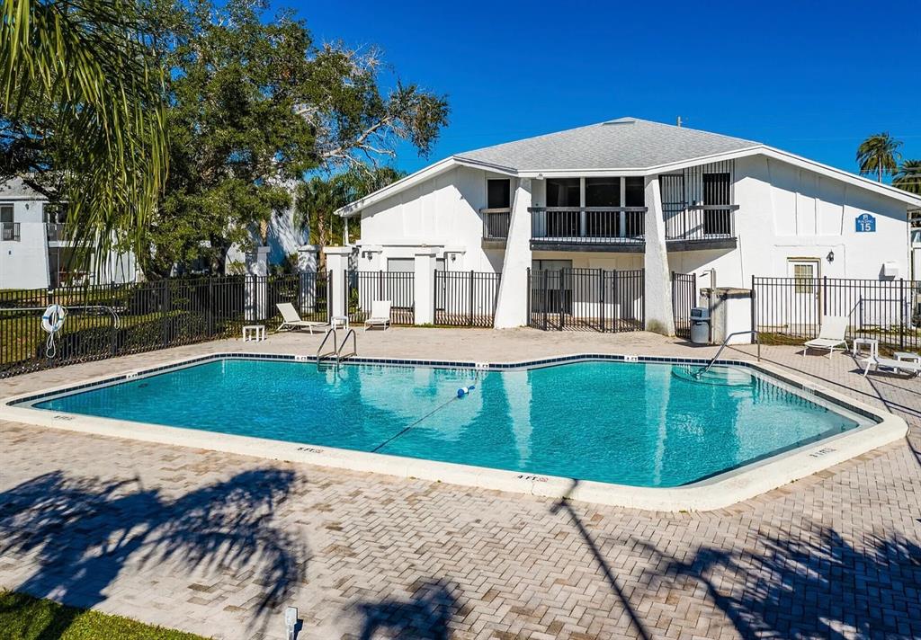 13300 Walsingham Road, Unit 6 Largo, FL 33774 - Photo 11 of 21 a front view of a house with swimming pool