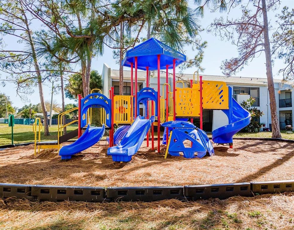 13300 Walsingham Road, Unit 6 Largo, FL 33774 - Photo 14 of 21 a view of a park with slide
