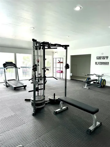 a view of a room with gym equipment