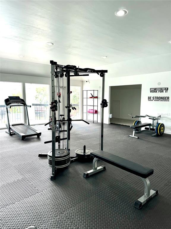 13300 Walsingham Road, Unit 6 Largo, FL 33774 - Photo 16 of 21 a view of a room with gym equipment