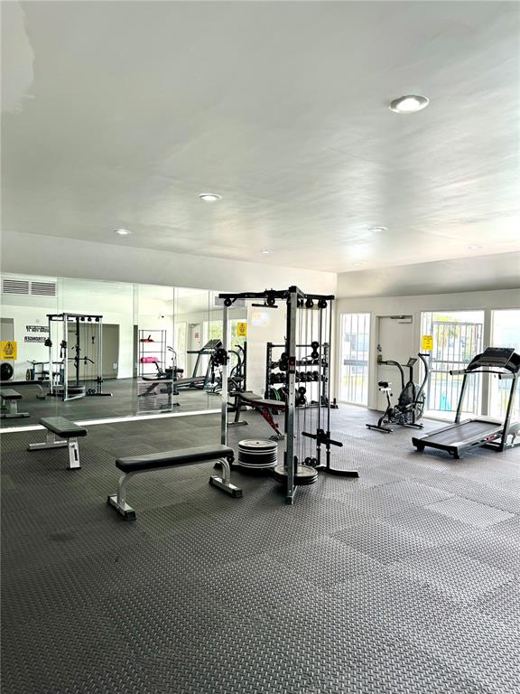 13300 Walsingham Road, Unit 6 Largo, FL 33774 - Photo 19 of 21 a view of a room with gym equipment