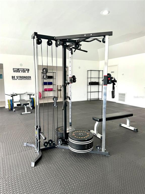 13300 Walsingham Road, Unit 6 Largo, FL 33774 - Photo 21 of 21 a room with gym equipment