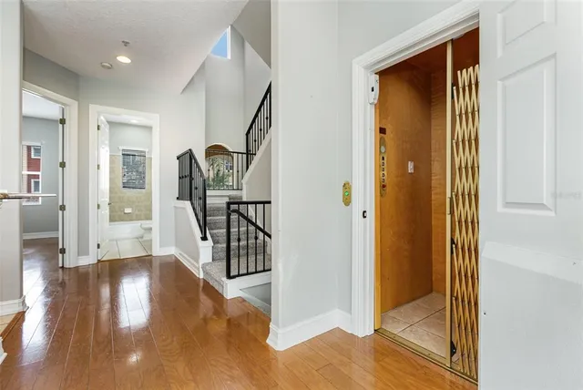 a view of entryway with wooden floor