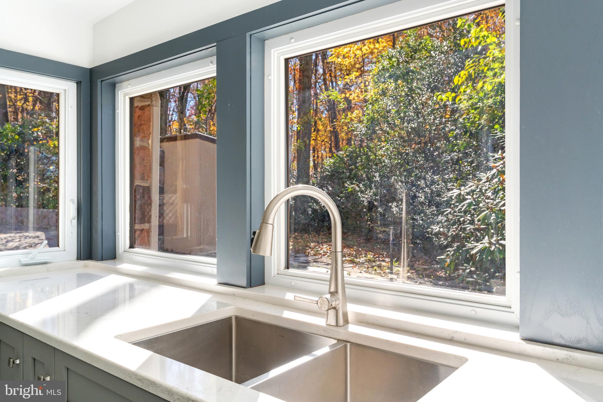3211 Pricetown Road Fleetwood, PA 19522 - Photo 22 of 71 a kitchen with a sink and large window with a garden view