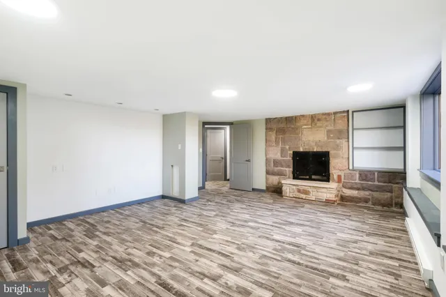 a bathroom with a bathtub and shower