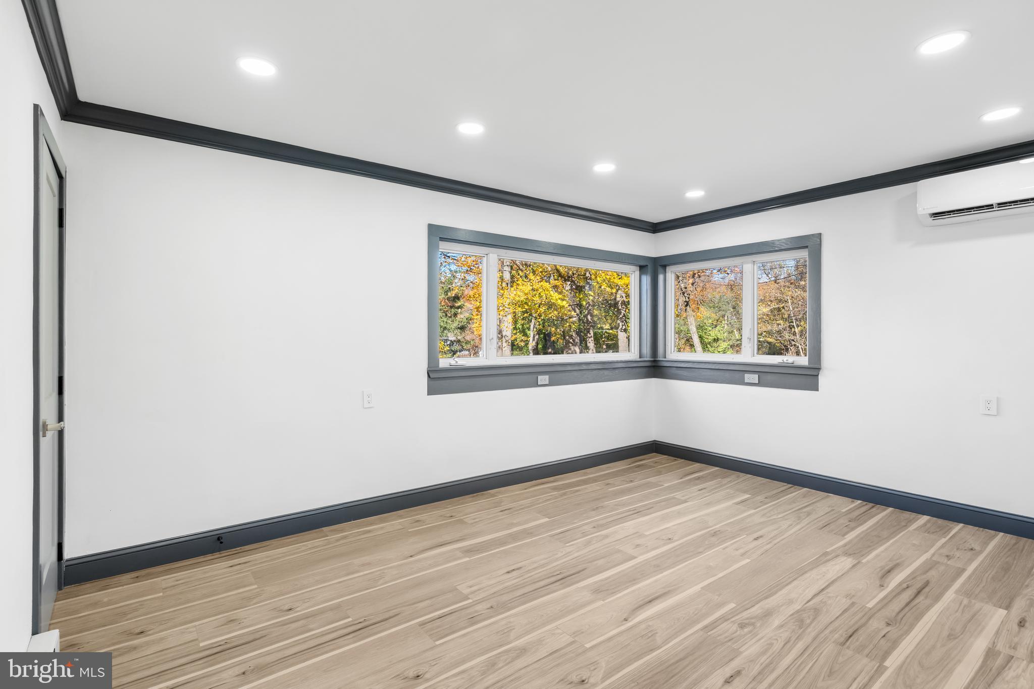 3211 Pricetown Road Fleetwood, PA 19522 - Photo 36 of 71 an empty room with wooden floor and windows