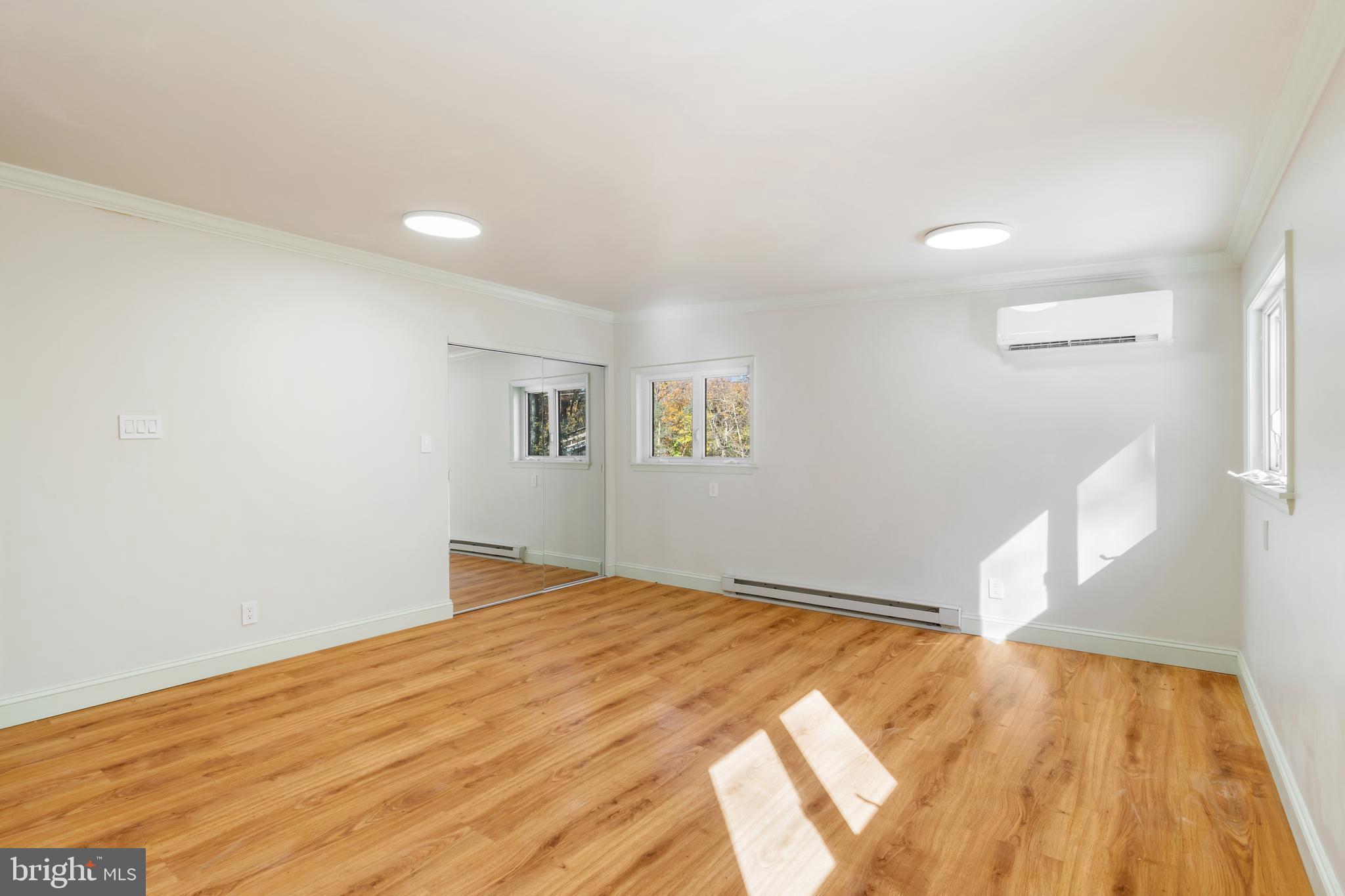 3211 Pricetown Road Fleetwood, PA 19522 - Photo 40 of 71 a view of empty room with wooden floor and fan