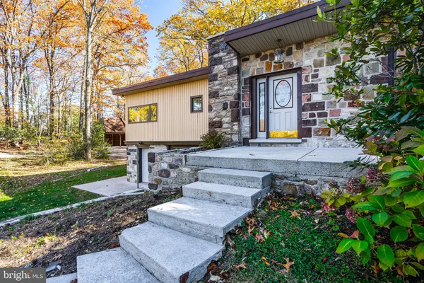 a view of a brick building with many windows