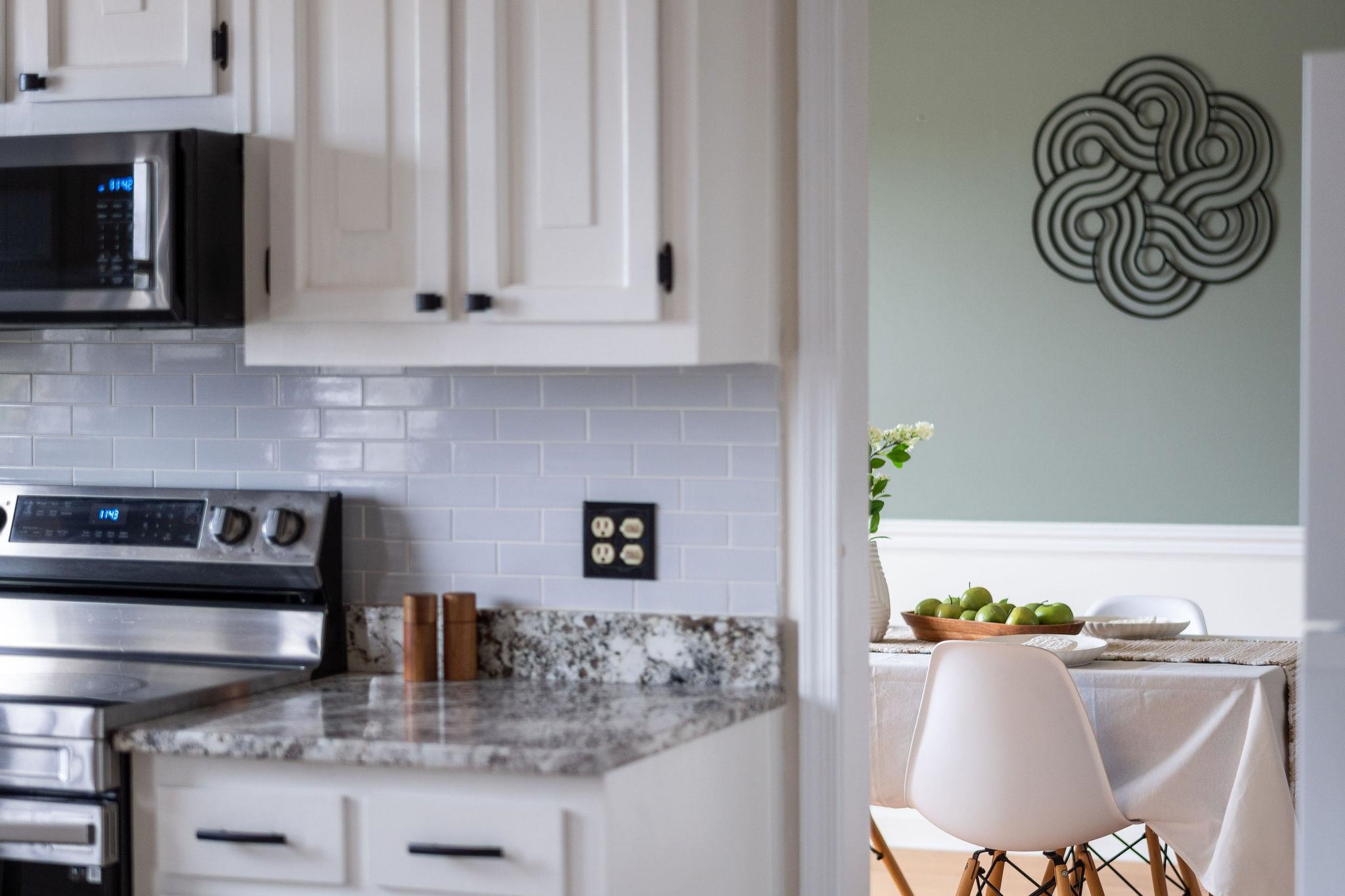 1222 Pinehurst Road Staunton, VA 24401 - Photo 12 of 52 a kitchen with stainless steel appliances granite countertop a stove a microwave a sink and cabinets