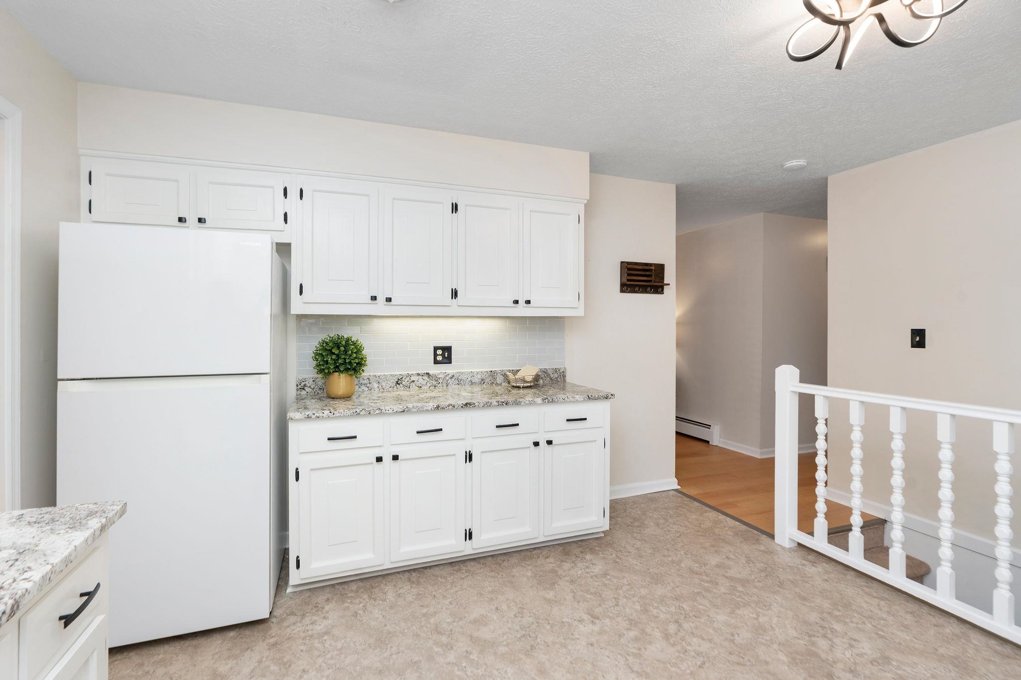 1222 Pinehurst Road Staunton, VA 24401 - Photo 17 of 52 a kitchen with stainless steel appliances a refrigerator and white cabinets