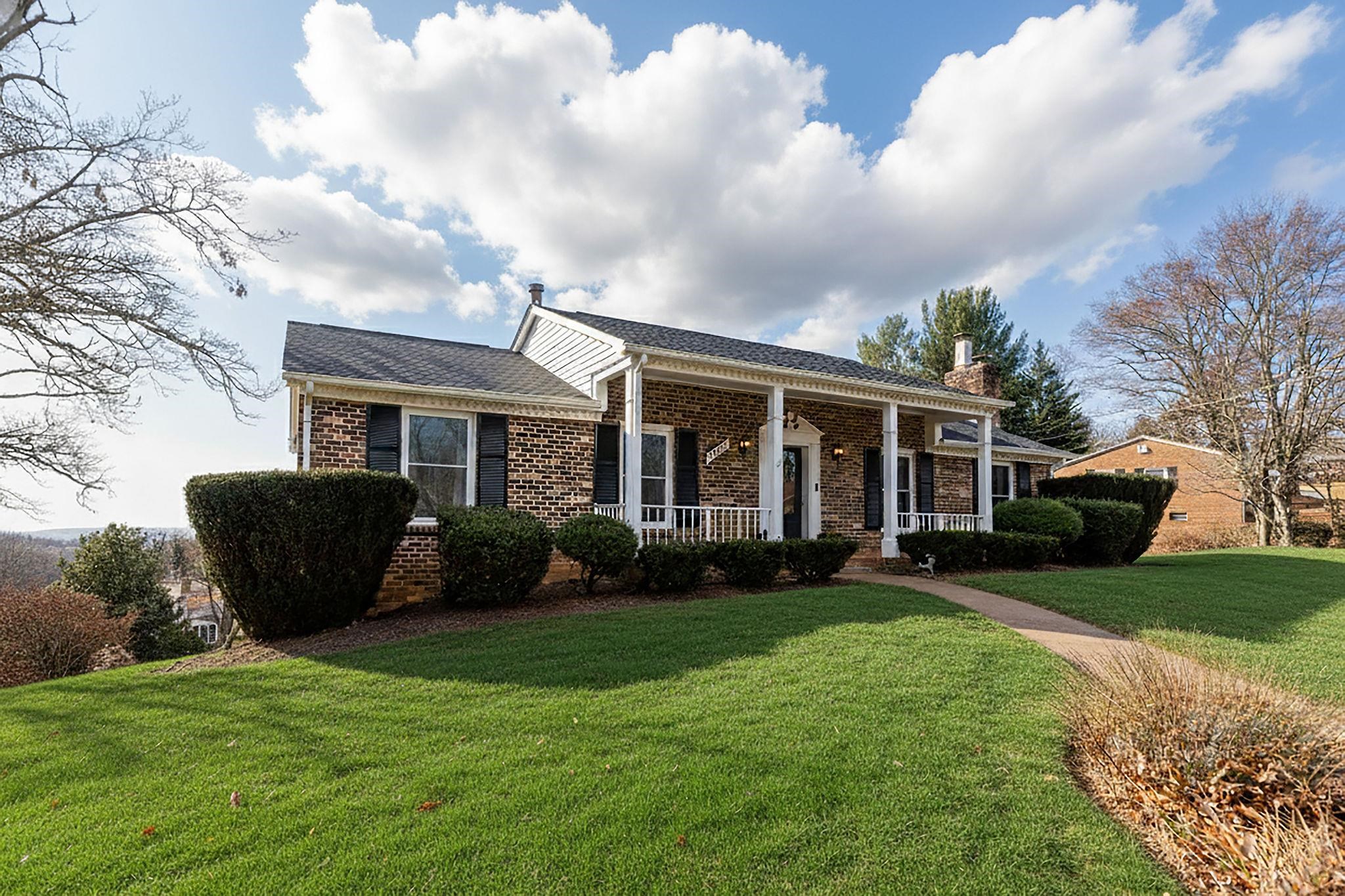 1222 Pinehurst Road Staunton, VA 24401 - Photo 2 of 52 a view of a house with backyard sitting area and garden