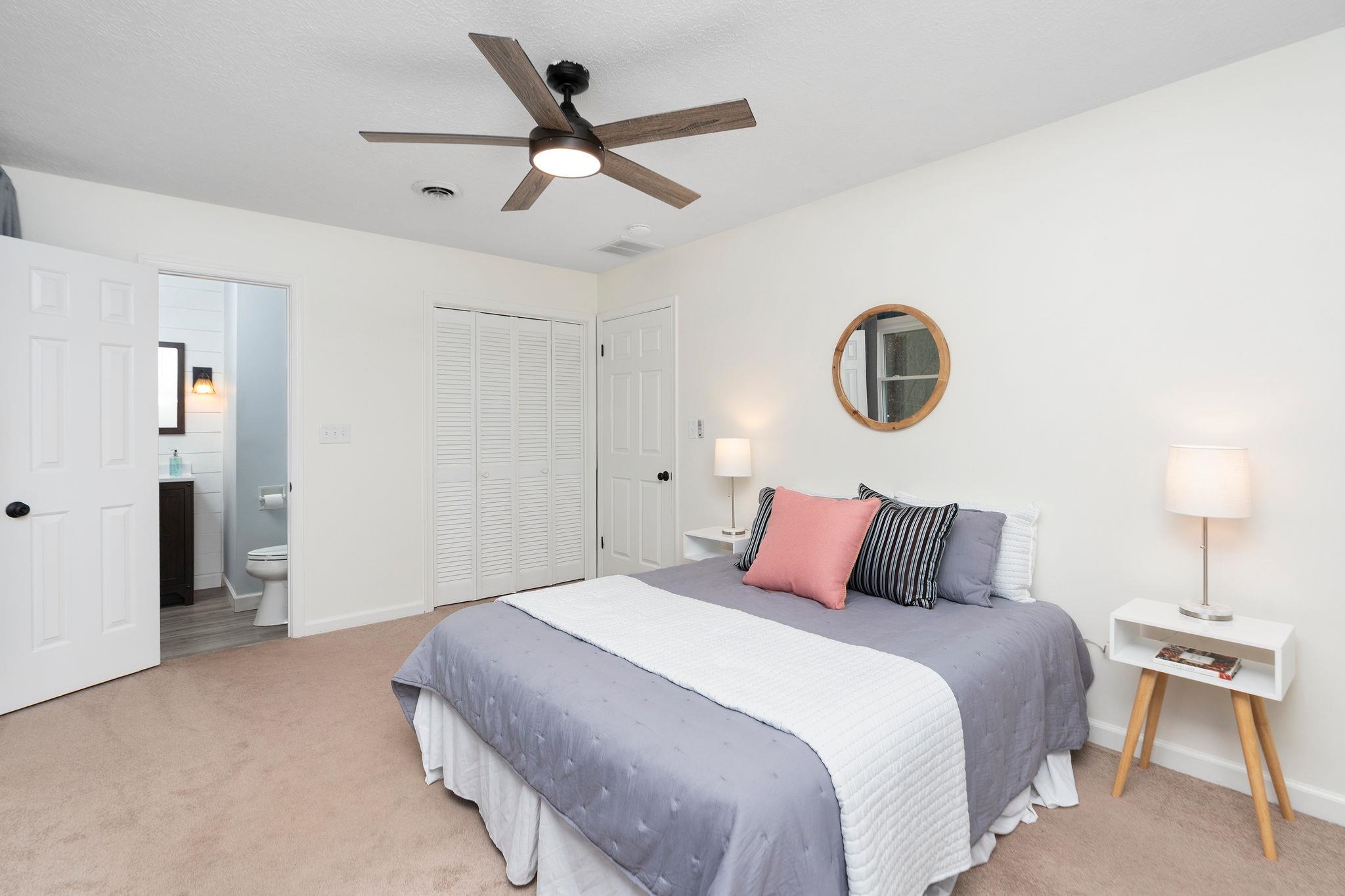 1222 Pinehurst Road Staunton, VA 24401 - Photo 22 of 52 a bedroom with a bed and a chandelier
