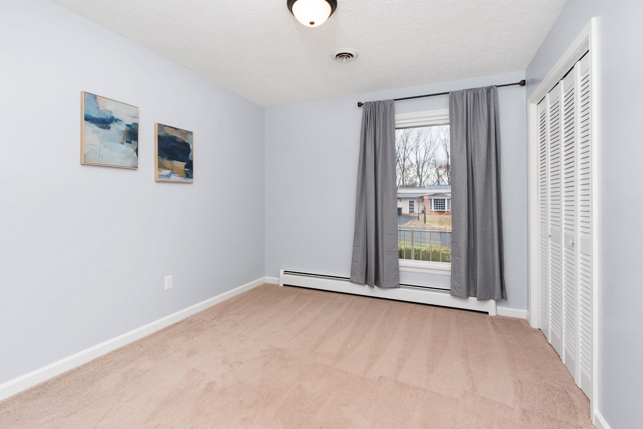 1222 Pinehurst Road Staunton, VA 24401 - Photo 25 of 52 a view of an empty room with a window