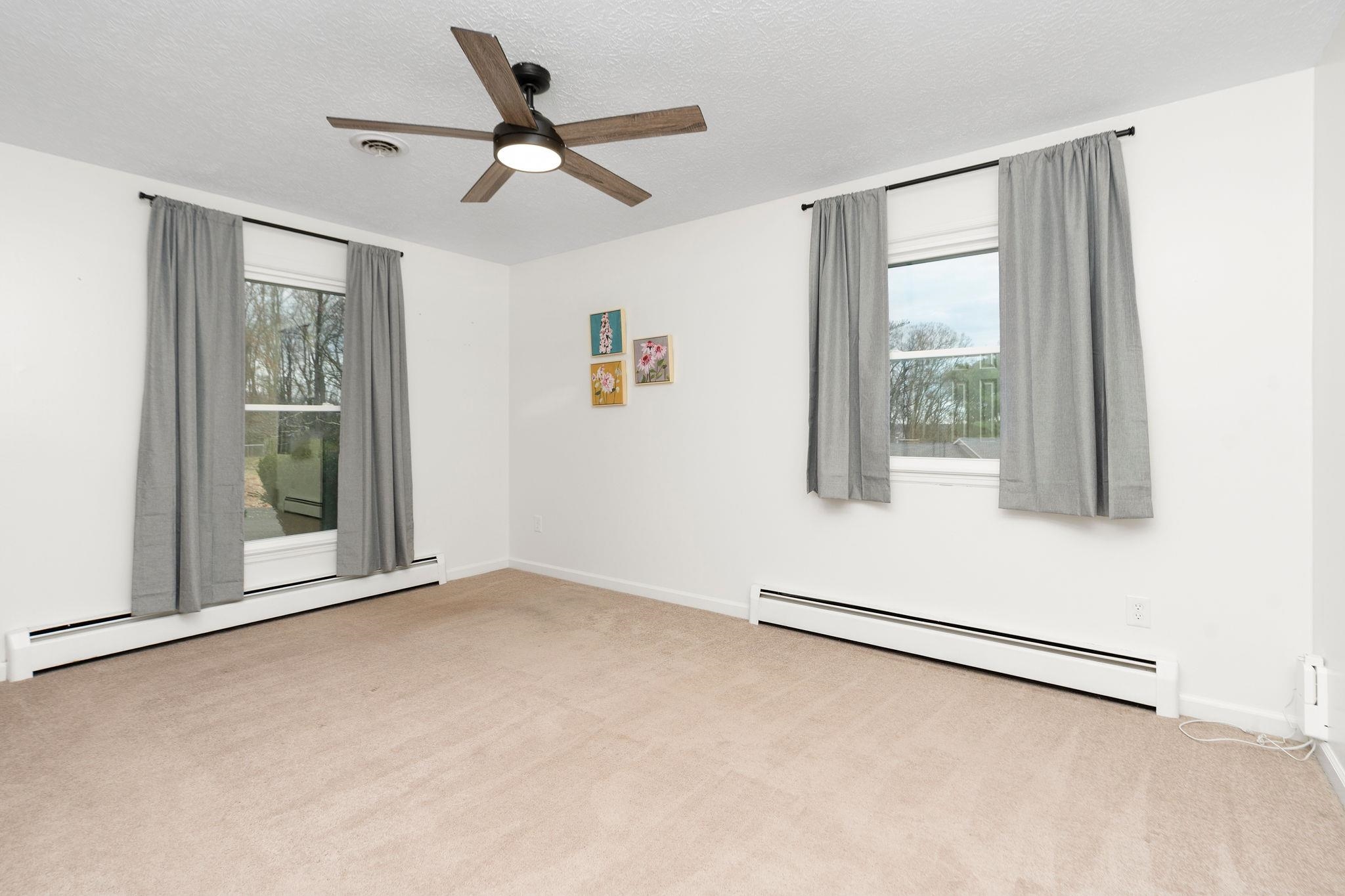 1222 Pinehurst Road Staunton, VA 24401 - Photo 27 of 52 a view of a livingroom with a ceiling fan and window