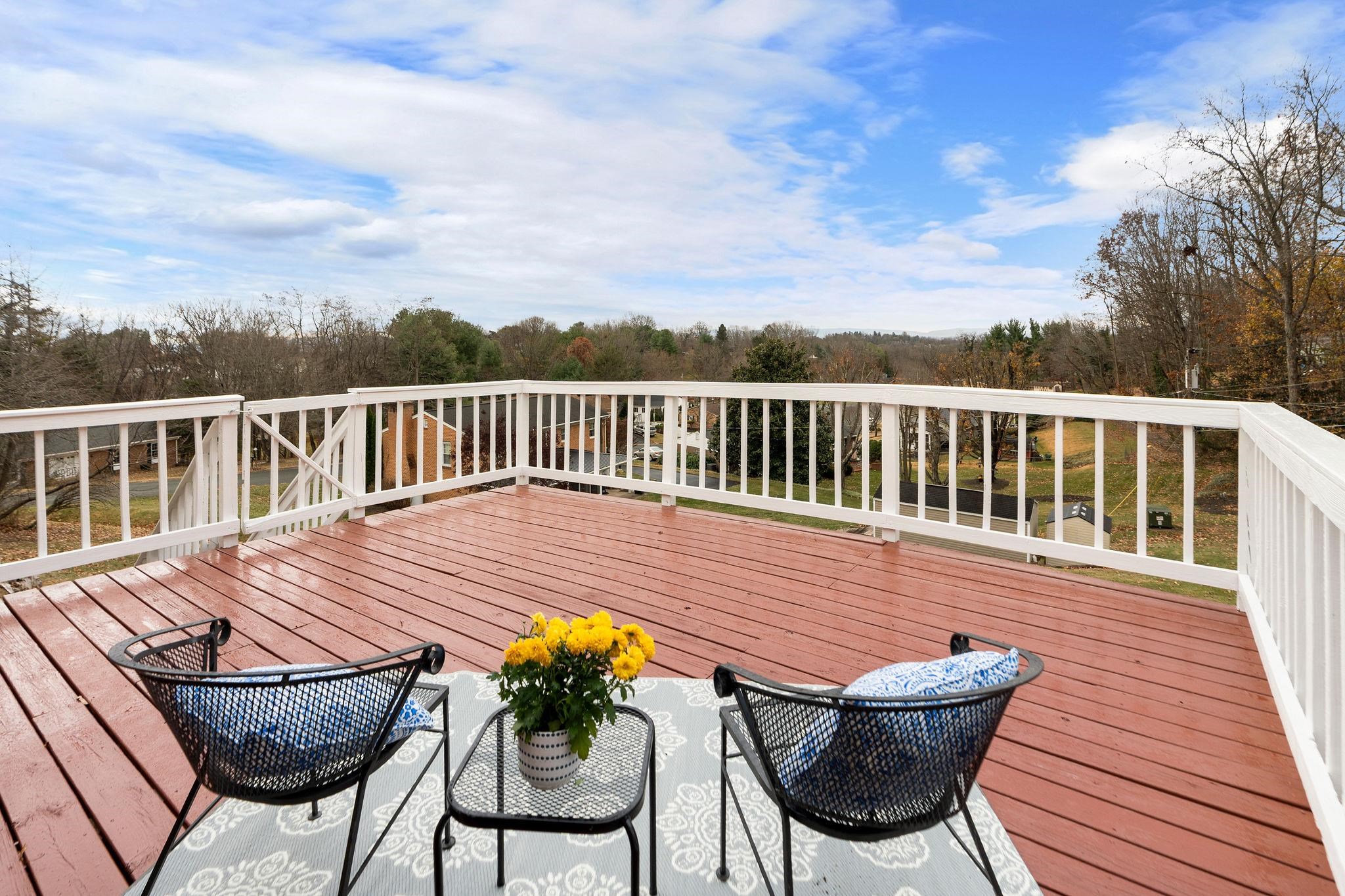 1222 Pinehurst Road Staunton, VA 24401 - Photo 30 of 52 a view of a chairs and table on the deck