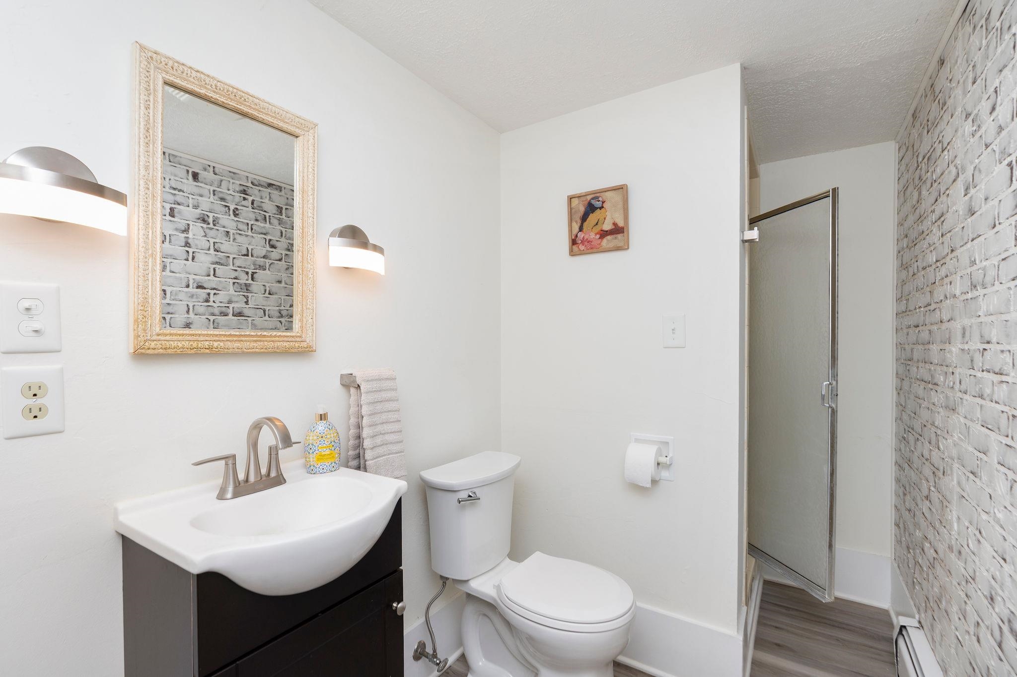 1222 Pinehurst Road Staunton, VA 24401 - Photo 37 of 52 a white toilet sitting next to a bathroom sink