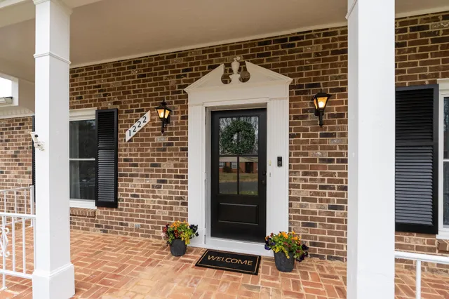 a front view of a house with a door
