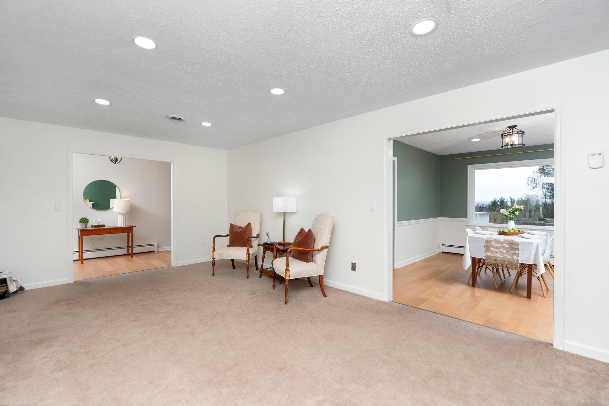 1222 Pinehurst Road Staunton, VA 24401 - Photo 8 of 52 a living room with furniture and a potted plant