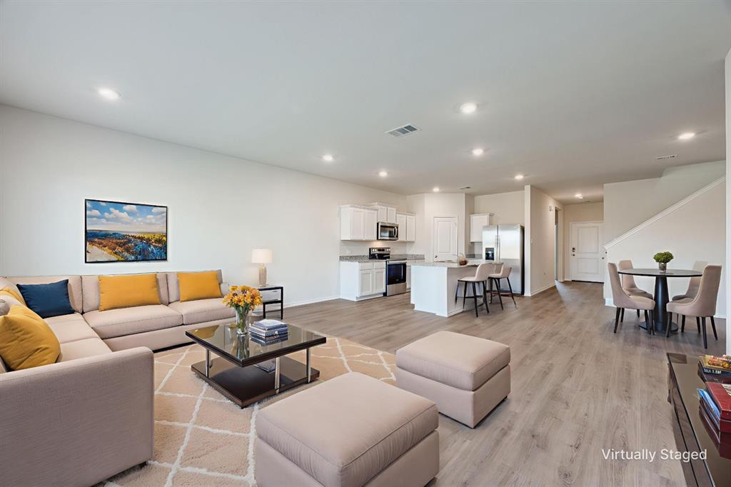3433 Marie Drive Sherman, TX 75090 - Photo 1 of 39 a living room with furniture and wooden floor