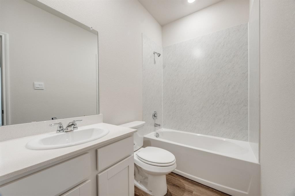 3433 Marie Drive Sherman, TX 75090 - Photo 24 of 39 a bathroom with a sink toilet and shower