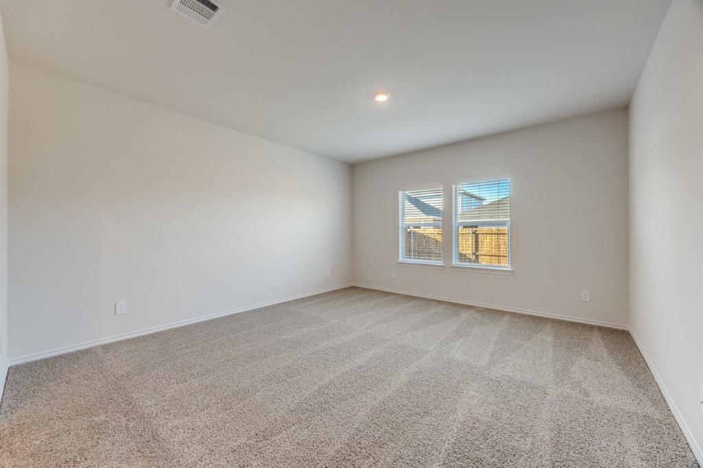 3433 Marie Drive Sherman, TX 75090 - Photo 25 of 39 a view of an empty room with a window
