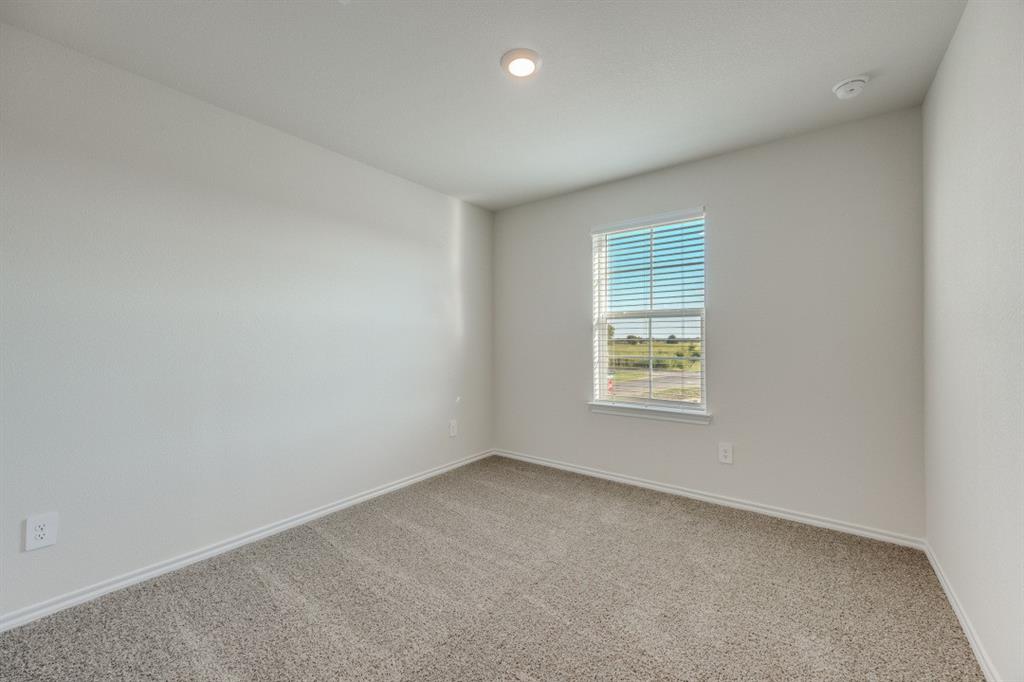 3433 Marie Drive Sherman, TX 75090 - Photo 31 of 39 an empty room with a window