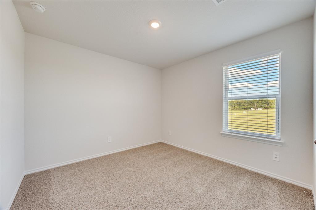 3433 Marie Drive Sherman, TX 75090 - Photo 34 of 39 an empty room with a window