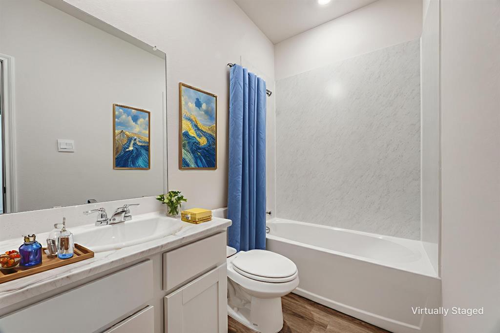 3433 Marie Drive Sherman, TX 75090 - Photo 5 of 39 a bathroom with a sink toilet and shower