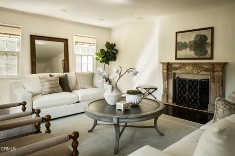 a kitchen with stainless steel appliances granite countertop a stove and a refrigerator