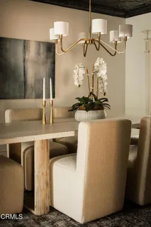 a kitchen with a stove and a refrigerator