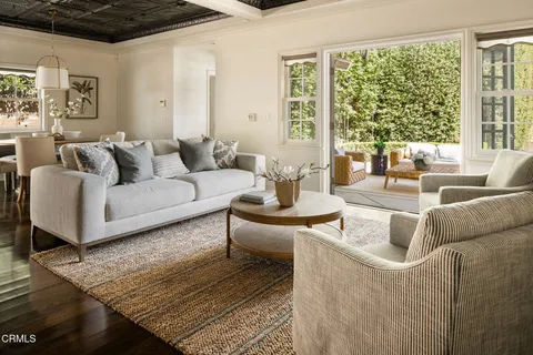 a bedroom with a bed and a table in it