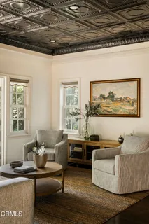 a bathroom with a sink a mirror and a shower