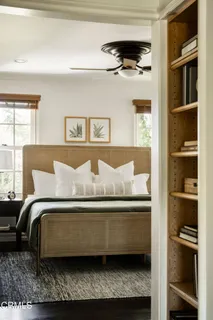 a bathroom with a granite countertop sink vanity and a mirror