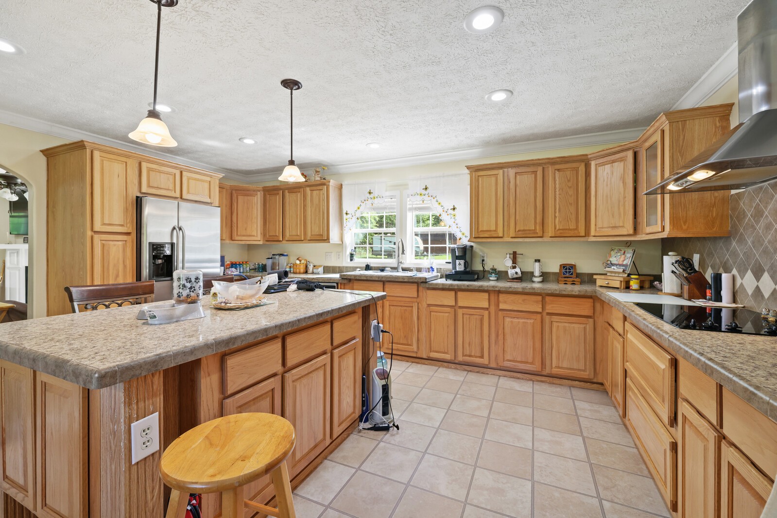 1637 Upper Standing Rock Road Dover, TN 37058 - Photo 11 of 57 a kitchen with a sink stove and cabinets