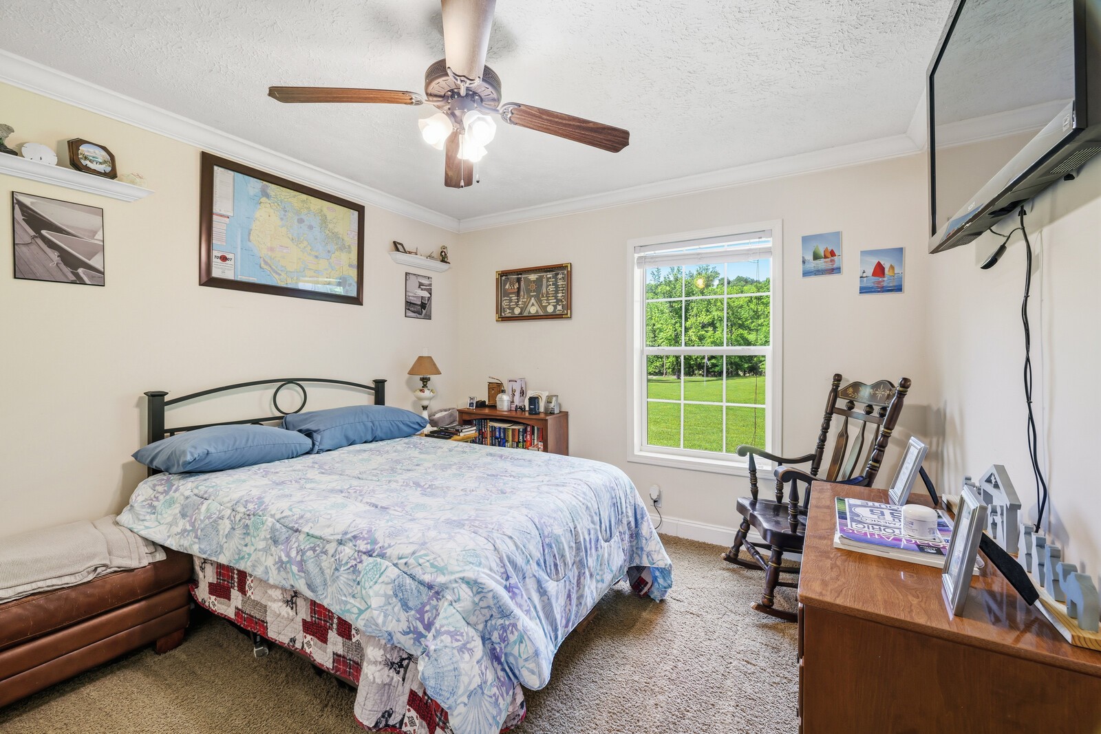 1637 Upper Standing Rock Road Dover, TN 37058 - Photo 23 of 57 a bedroom with a bed a couch and a window