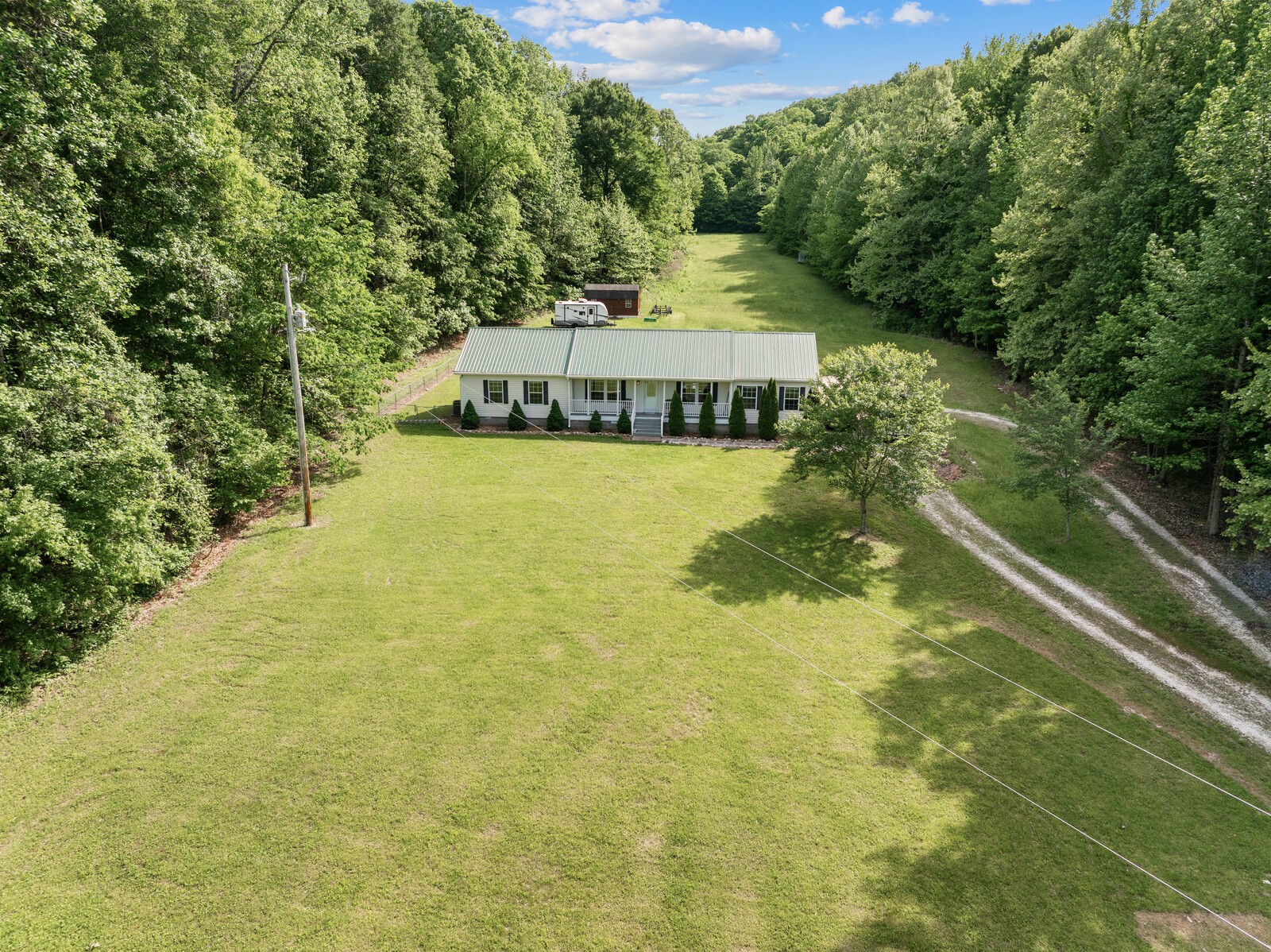 1637 Upper Standing Rock Road Dover, TN 37058 - Photo 43 of 57 a swimming pool with trees in the background