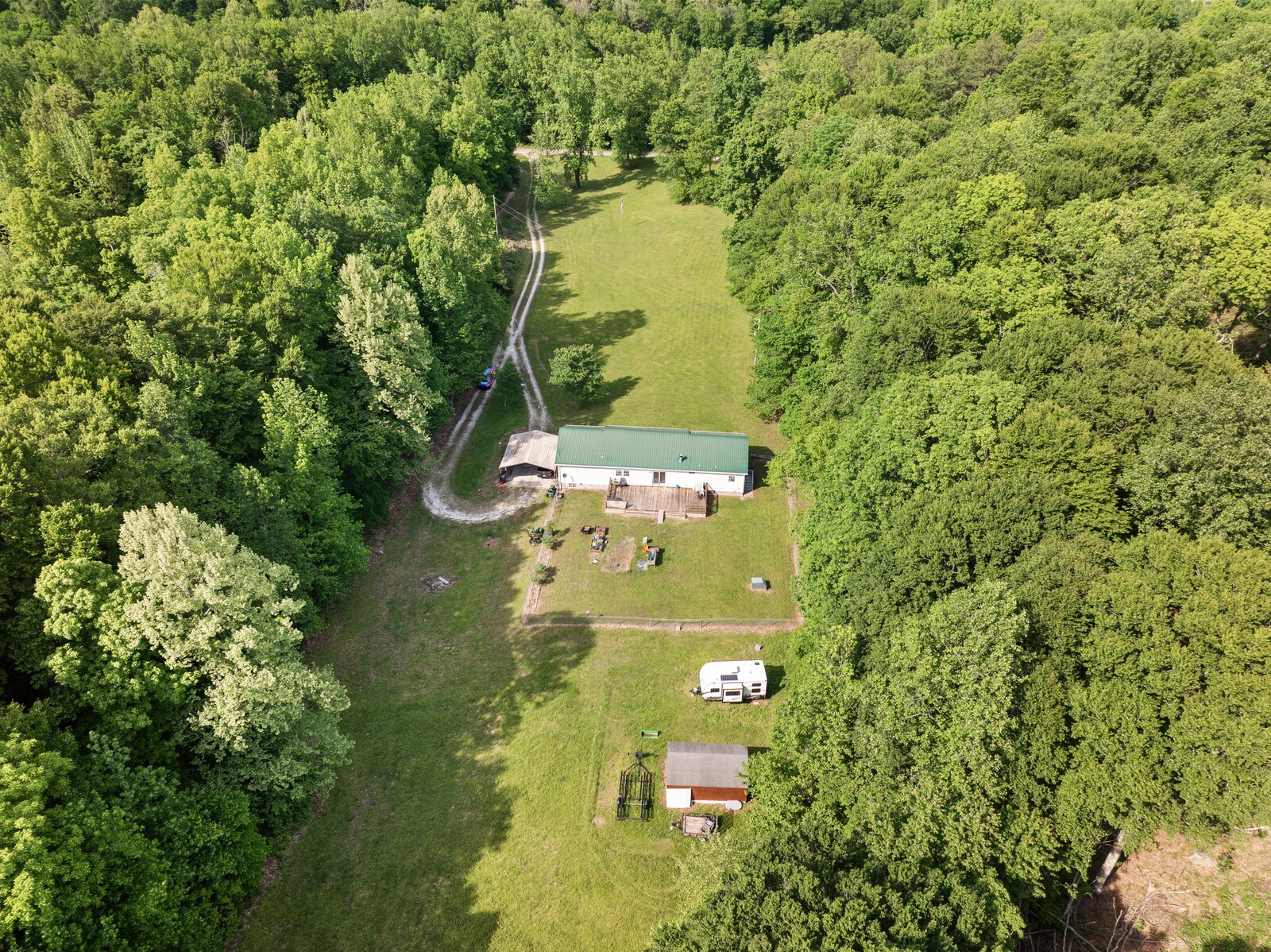 1637 Upper Standing Rock Road Dover, TN 37058 - Photo 57 of 57 an aerial view of residential house with outdoor space and trees all around