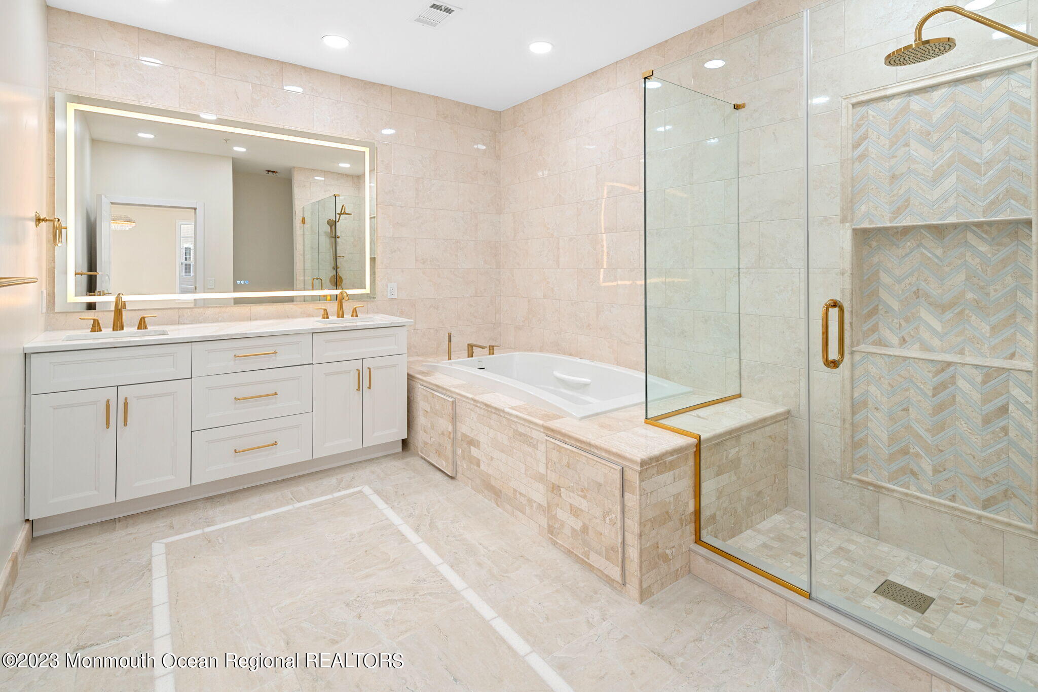 116 Potts Road Morganville, NJ 07751 - Photo 33 of 34 a spacious bathroom with a tub shower and sink