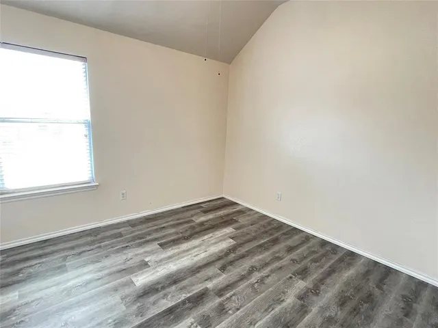 a view of a room that has a window in it