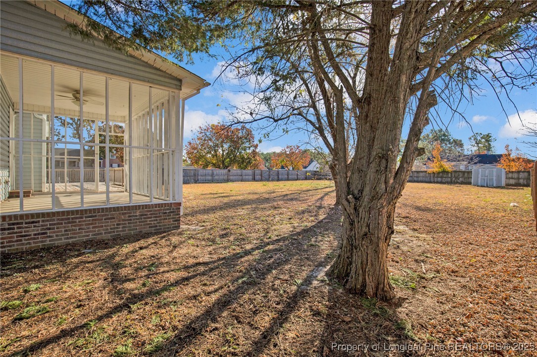 101 2 Hours Court Raeford, NC 28376 - Photo 30 of 30 a tree in the middle of a yard