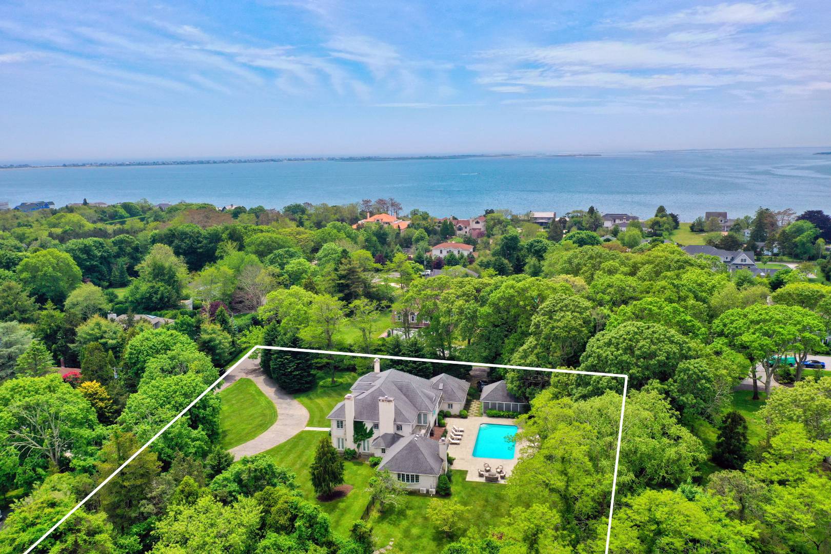 23 Basket Neck Lane Remsenburg, NY 11960 - Photo 1 of 17 a view of a garden from a balcony