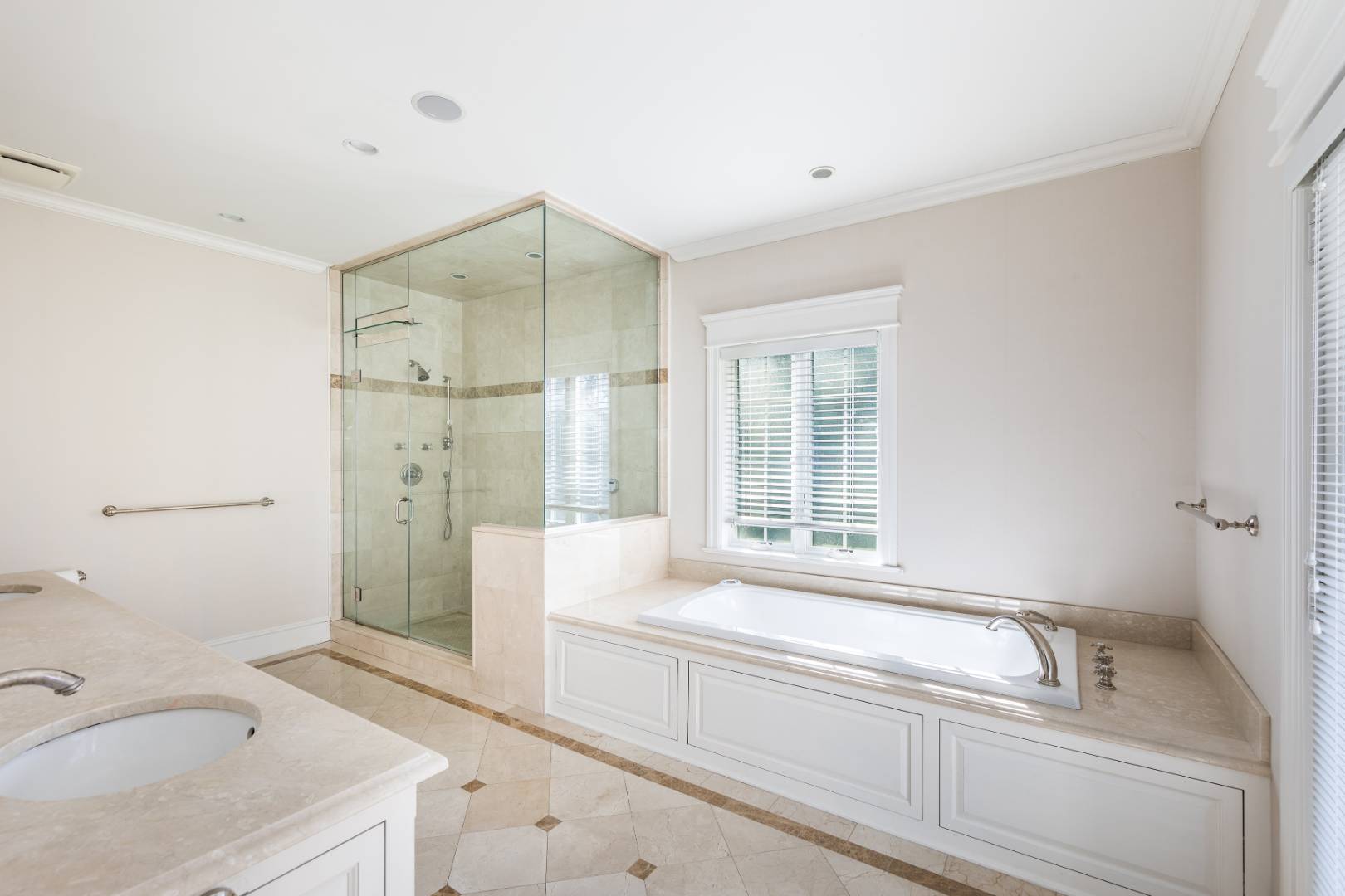 23 Basket Neck Lane Remsenburg, NY 11960 - Photo 14 of 17 a bathroom with a tub sink and mirror