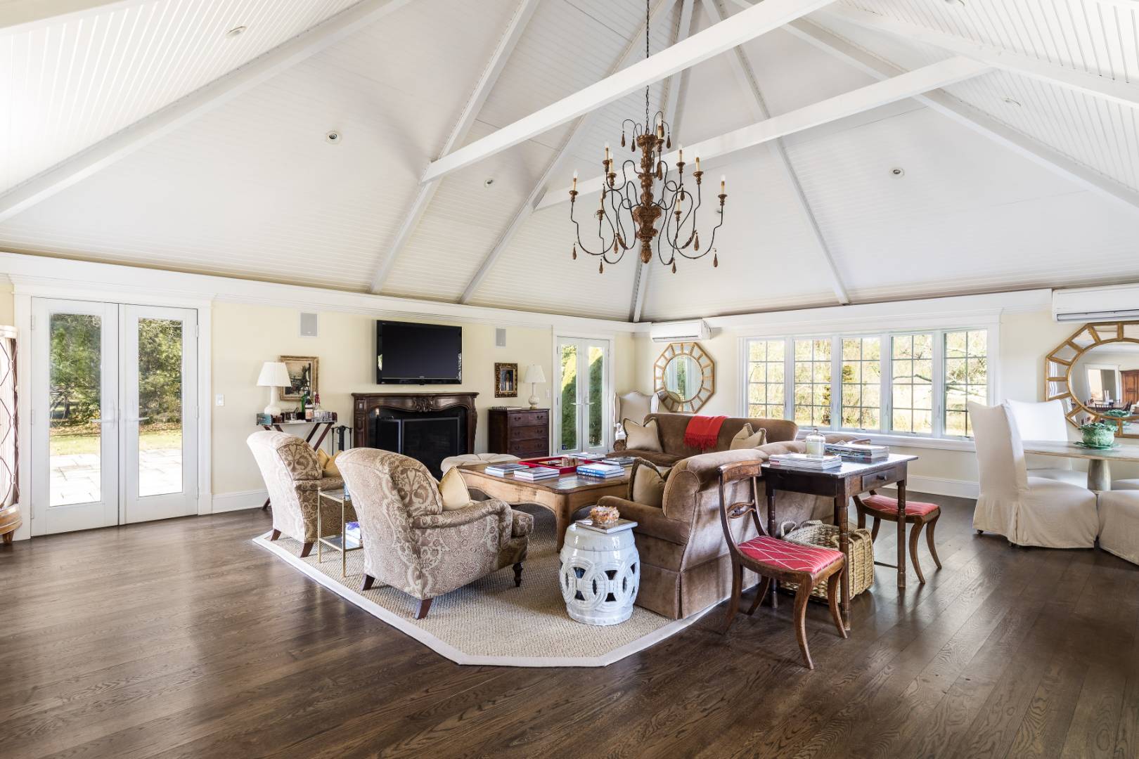 23 Basket Neck Lane Remsenburg, NY 11960 - Photo 5 of 17 a living room with furniture and a flat screen tv